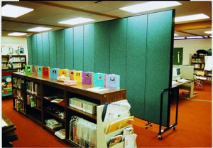 A movable wall divides a library and a new computer lab Instant classroom for new computer lab with the help of a portable wall