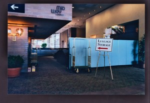 Screenflex Room Divider in a hotel to block off luggage