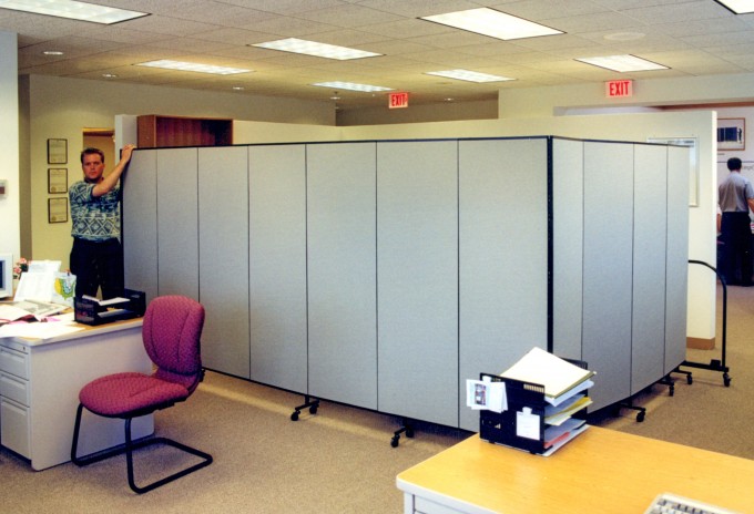 Outside that same office. Yes, there is a complete office on the other side of the acoustical divider Outside that same office. Yes, there is a complete office on the other side of the acoustical divider