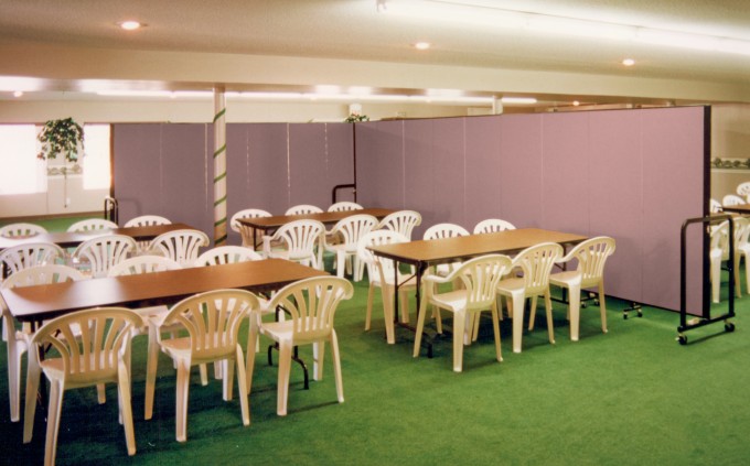 Party room dividers create an intimate banquet room in a banquet hall. 