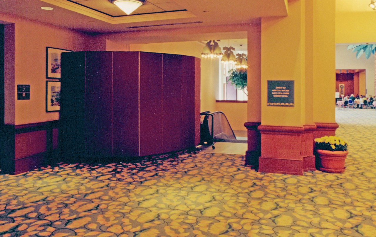 A room divider protects guests from using a escalator under repair