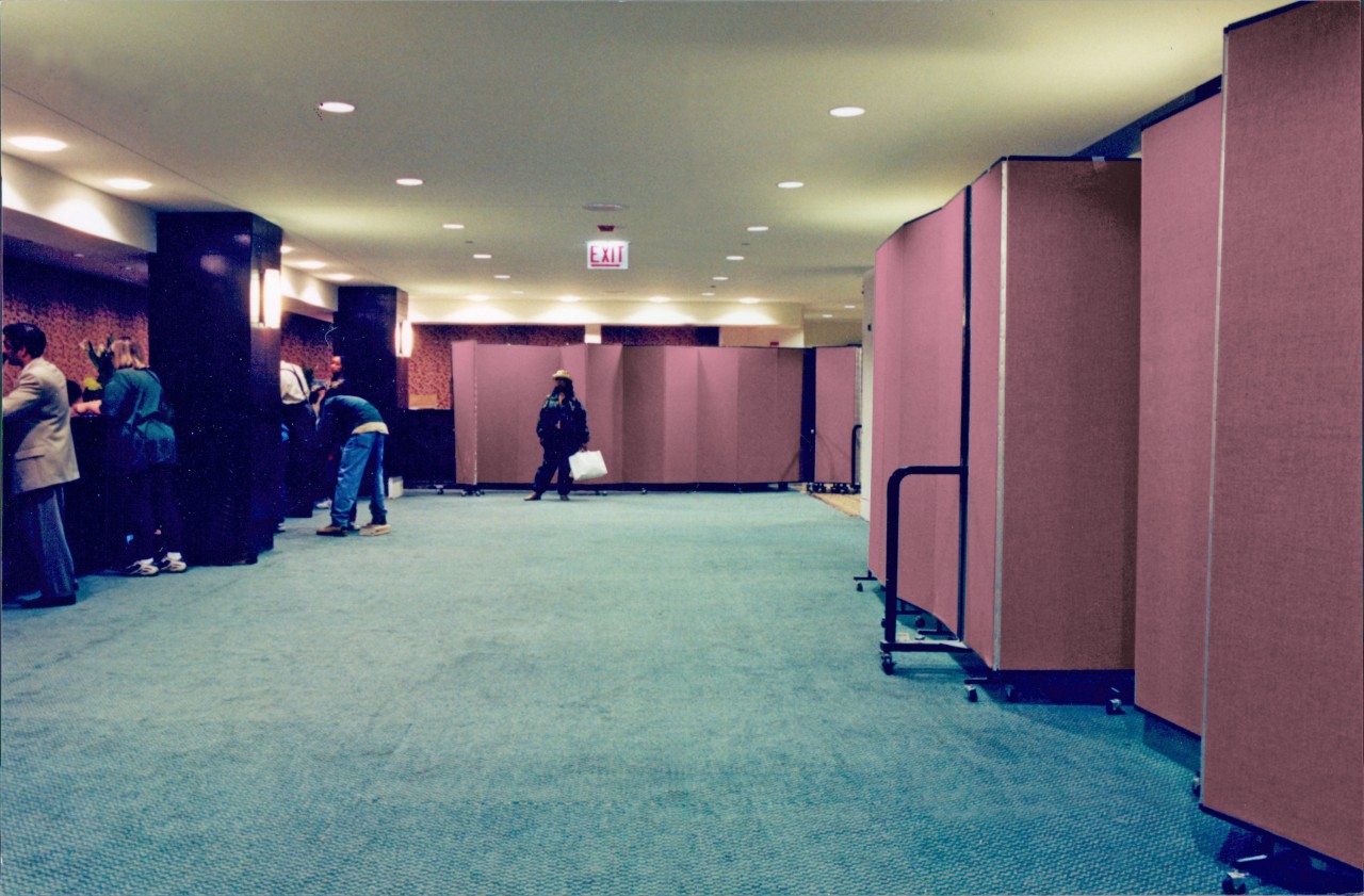 Portable partitions hide construction for hotel guests checking in