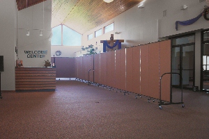 Church wall partitions direct traffic in a church lobby Room Divider creates a walkway in a church atrium