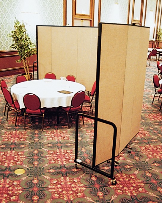 Screenflex Room Divider around a round table and chairs in a banquet hall