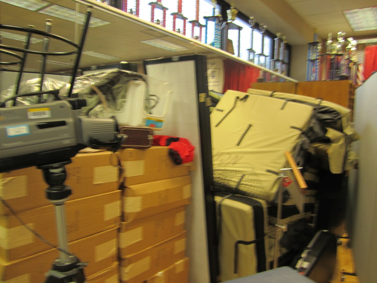 Room dividers hide storage area in a school office