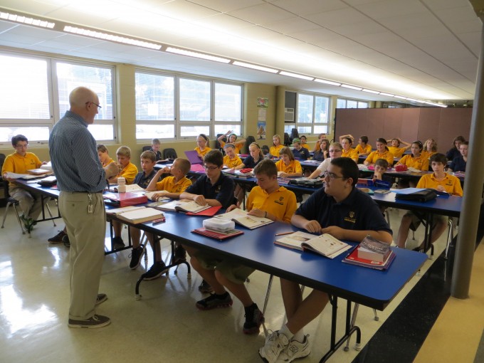 Temporary classroom set up for students to listen to a speaker.