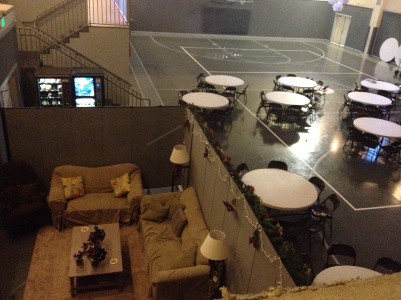 Designated Prayer Room with couches in a gym created with room dividers