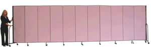 A lady walking opening and closing a room divider