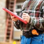 A man with a clipboard and pen