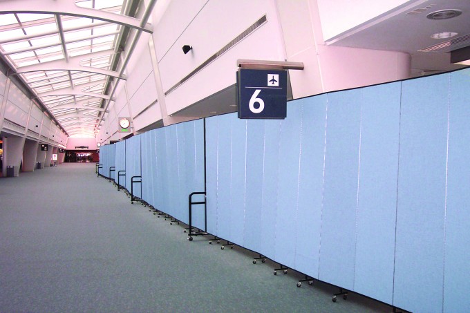 The Benefits of Using Rolling Temporary Walls For Aviation Facility Management & Security | Screenflex Portable Partitions temporary walls for trafic slow