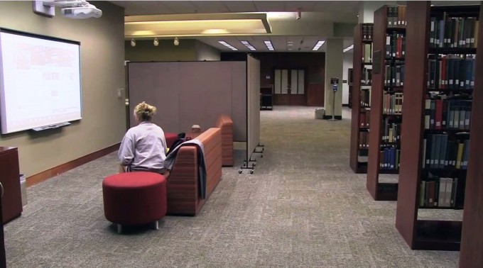 A quiet seating area amongst book stacks at Woodruff Health Sciences Center Library of Emory University.