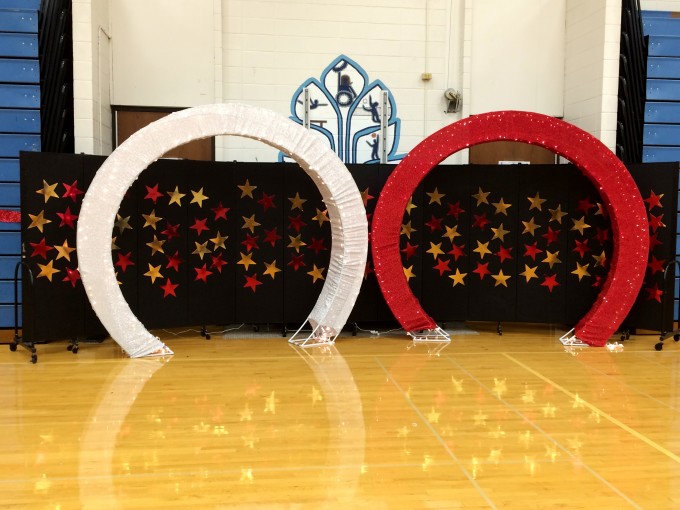 Portable Room Dividers serve as a school dance photo backdrop