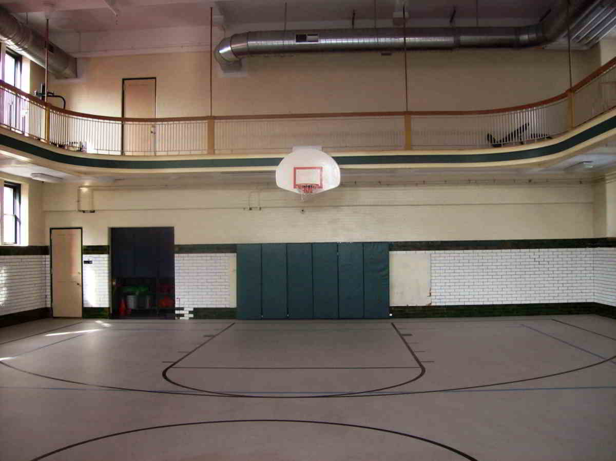 Room dividers creating classrooms in a school gym