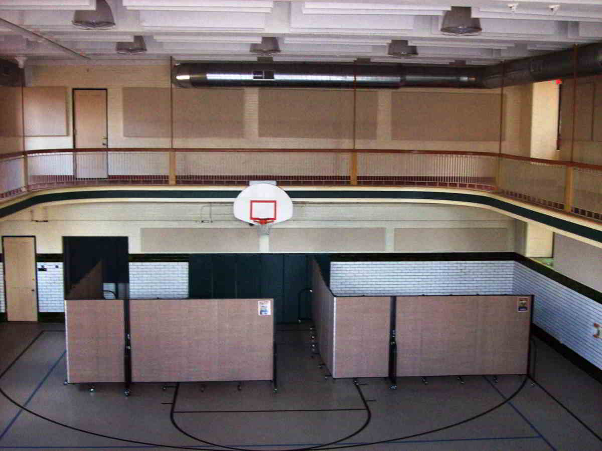 room dividers creating classrooms in a school gym