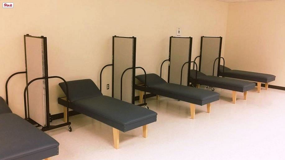 portable walls between beds in school nurse's office