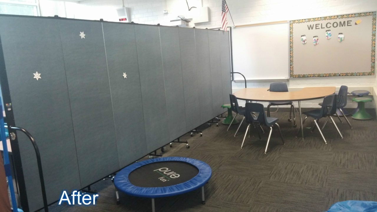 A room divider splits a therapy classroom in two