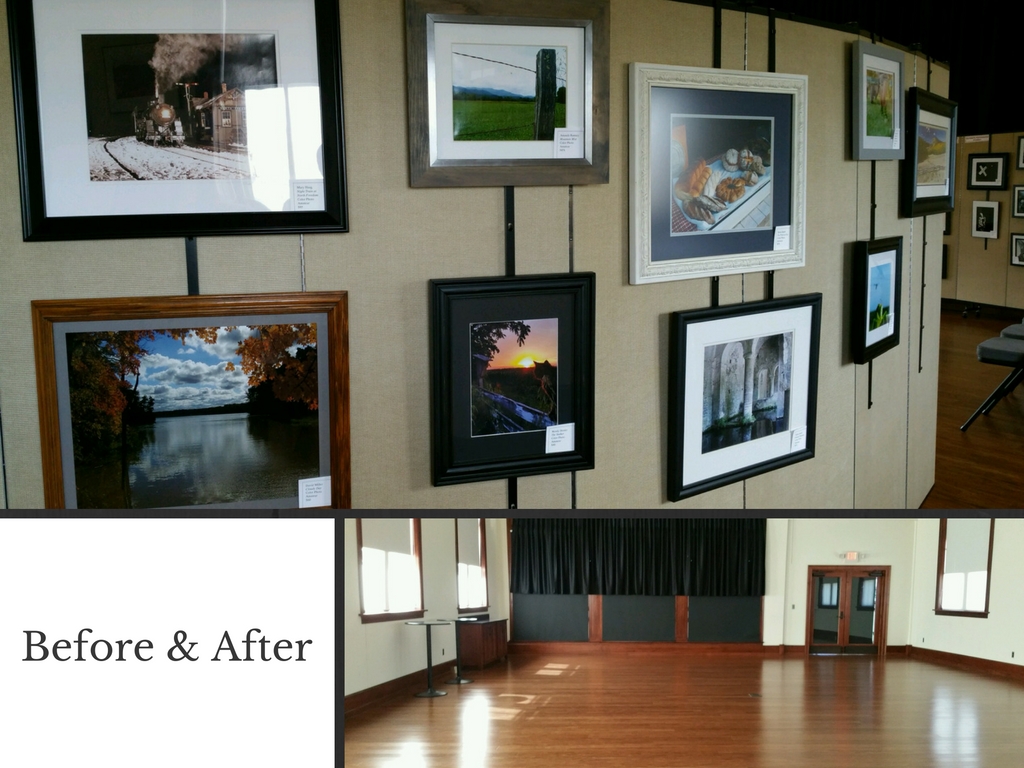 Heavy artwork hung on a Screenflex Room Divider with Artwork Hangers