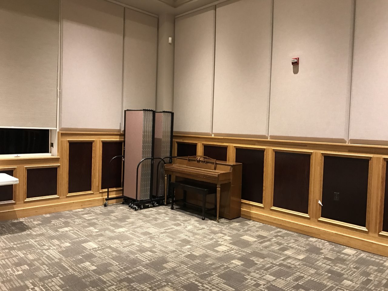 Church room divider stores compactly