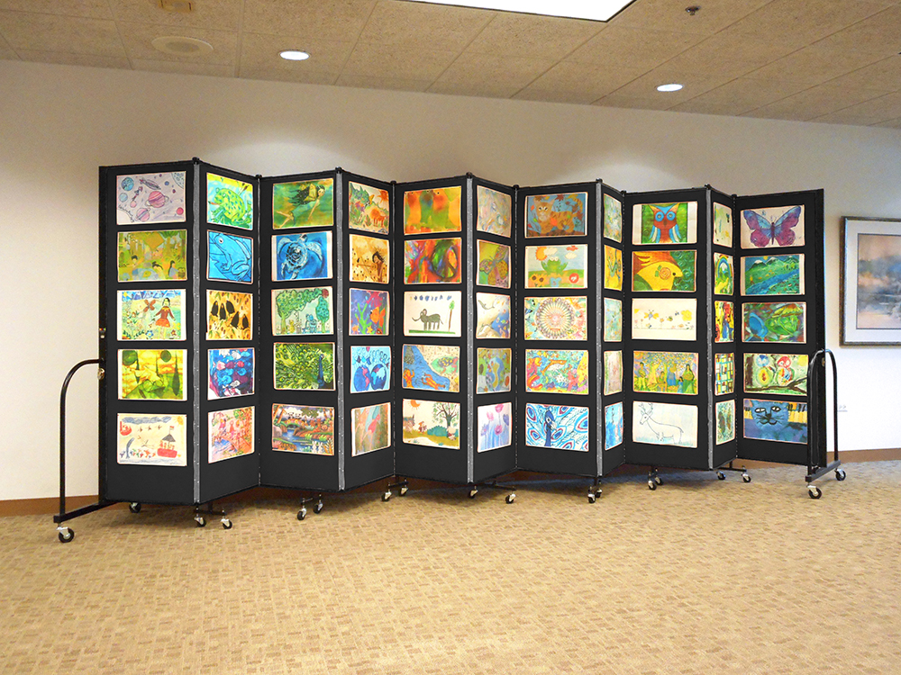 Tack, pin or staple artwork to both sides of the portable education art display wall