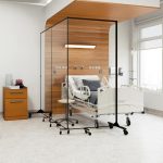 Clear Room Dividers Partially Surround Hospital Bed