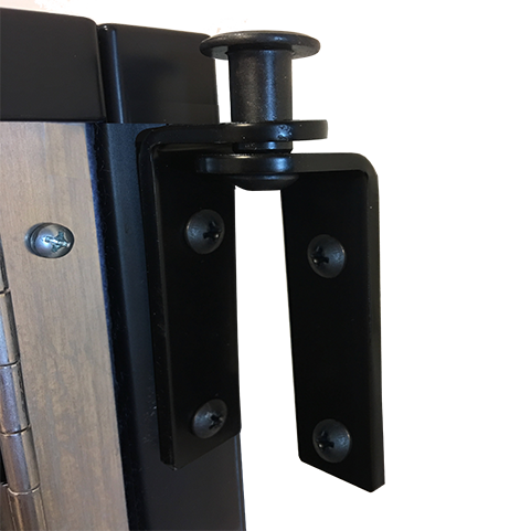 A Black Pivot Bracket Connects to a Wall and Study Carrels for Easy Mobility